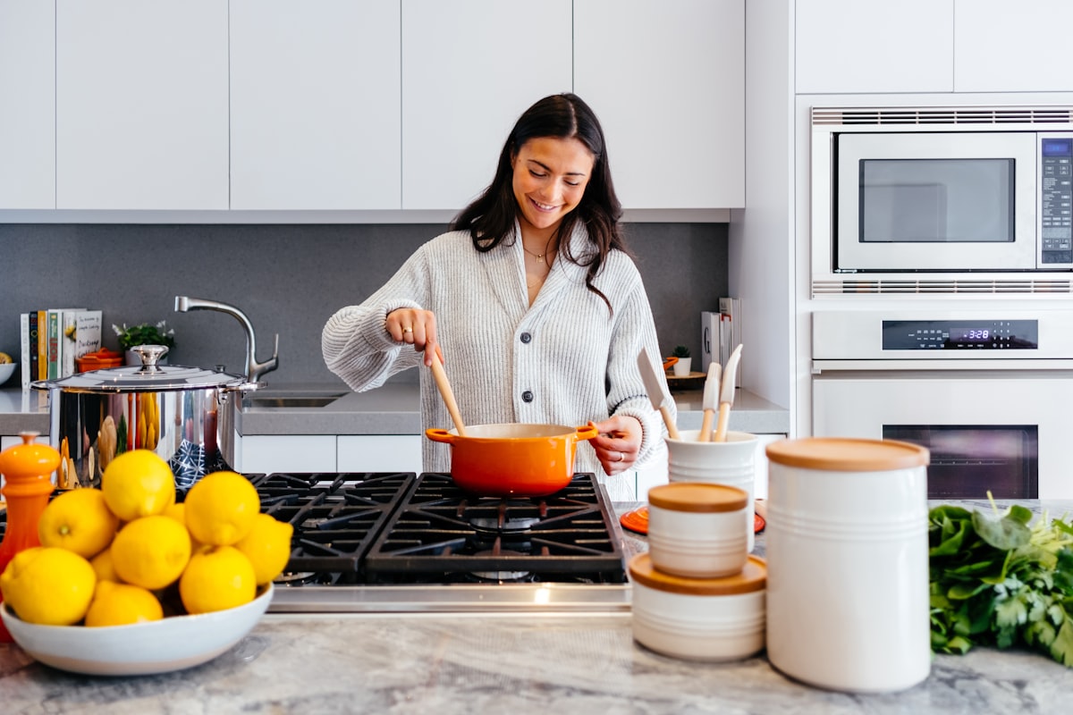 Gas range and built-in wall oven in a kitchen
